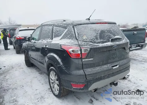 2017 Ford Escape Titanium z USA, uszkodzony, nr VIN 1FMCU9J99HUE89713
